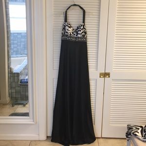 EVENING GOWN WITH SHAUL AND TRAIN